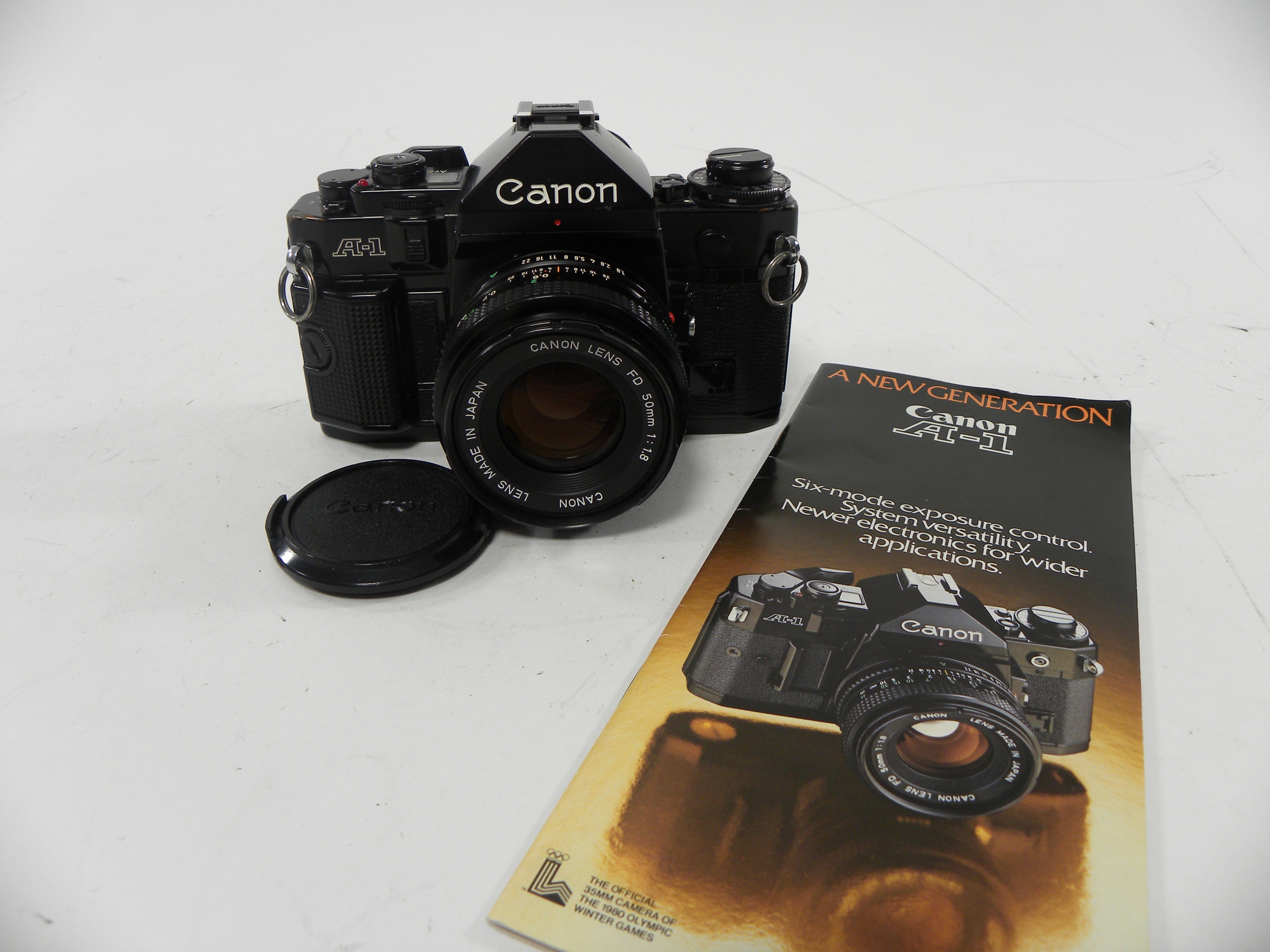Canon A-1 35mm SLR w/FD 50mm f1.8 – Camera Exchange