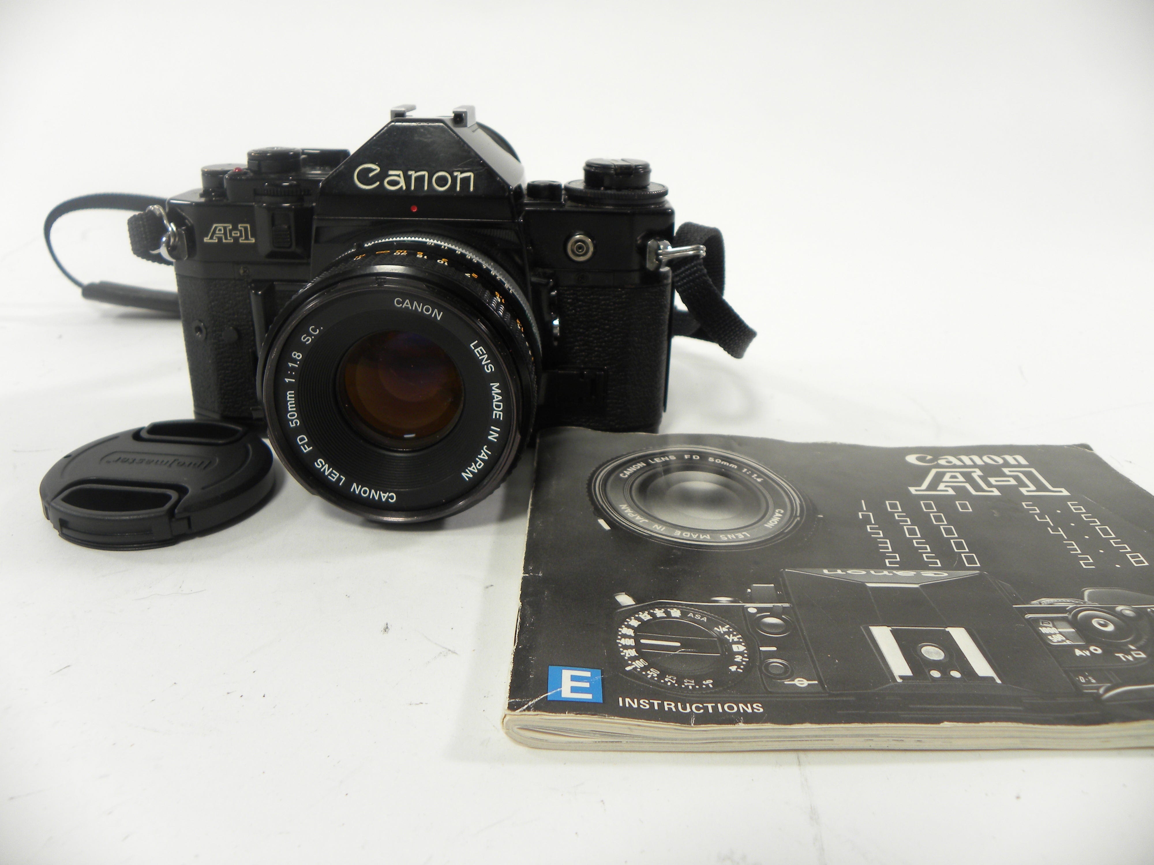 Canon A-1 35mm SLR w/FD 50mm f1.8 S.C. – Camera Exchange