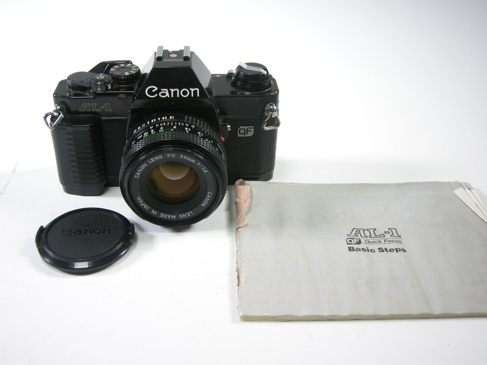 Canon AL-1 35mm SLR w/FD 50mm f1.8 – Camera Exchange