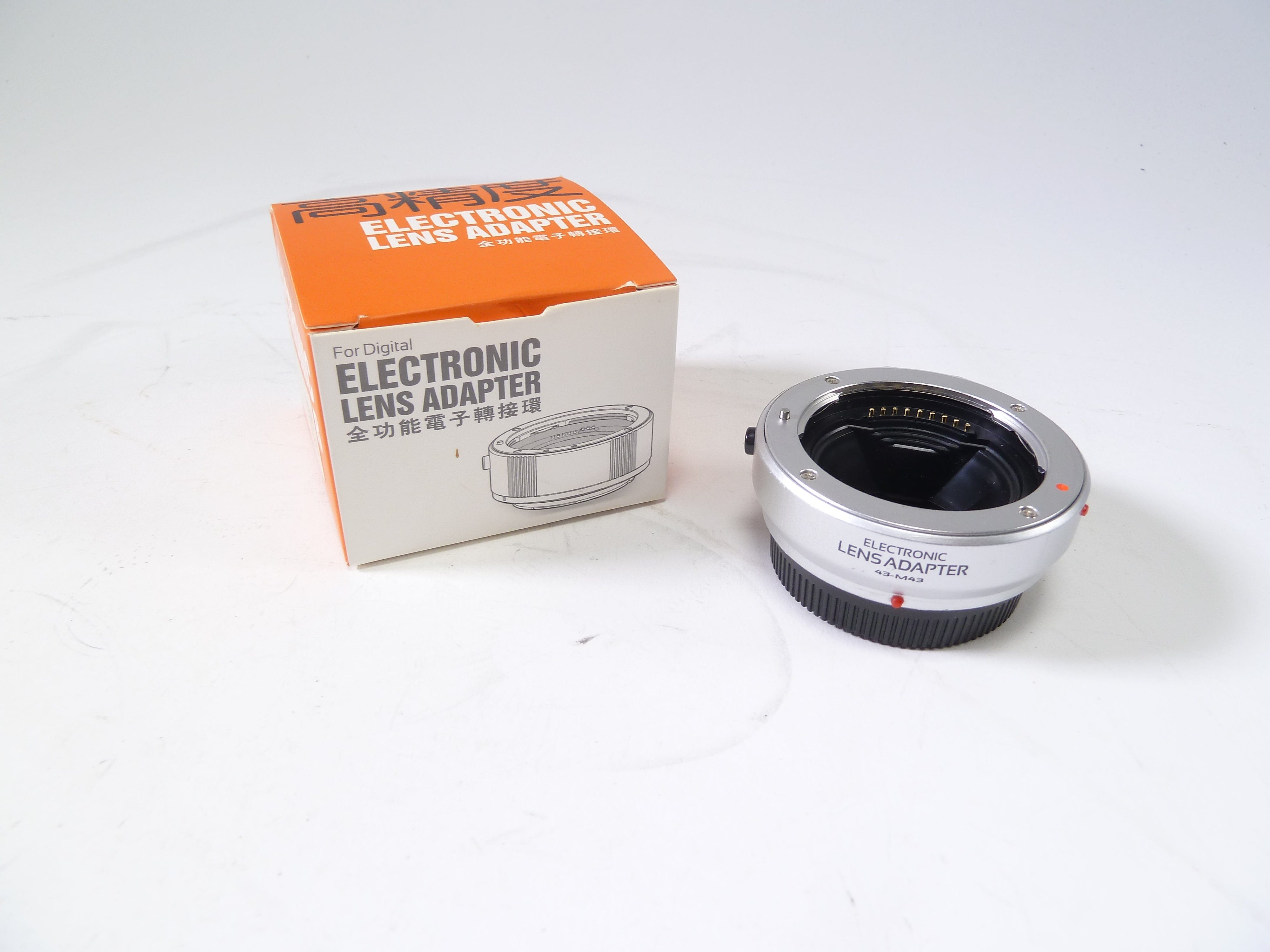 Electronic Lens Adapter for Full 4/3 to Micro 4/3 Camera Exchange