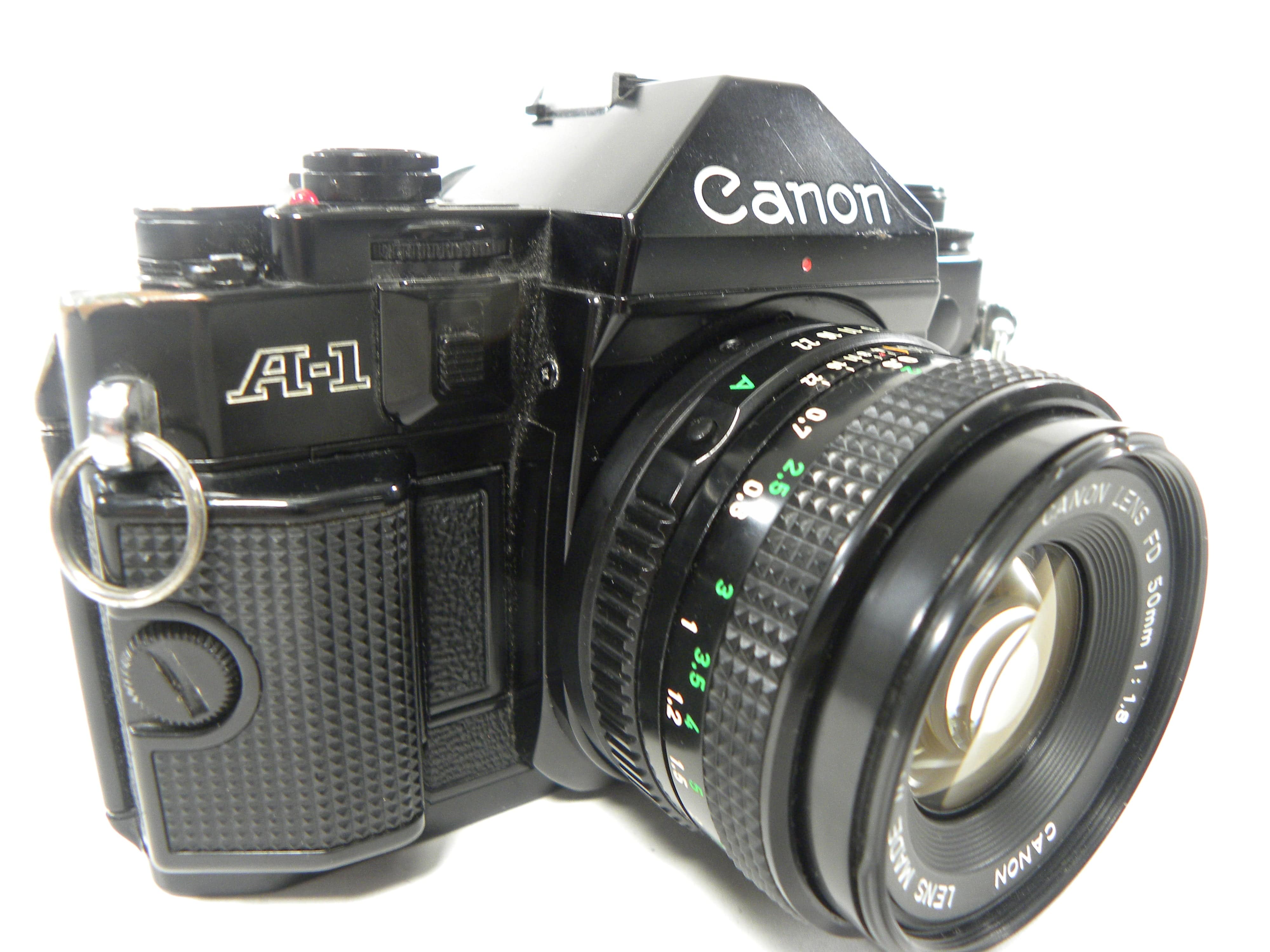 Canon A-1 35mm SLR w/FD 50mm f1.8 – Camera Exchange