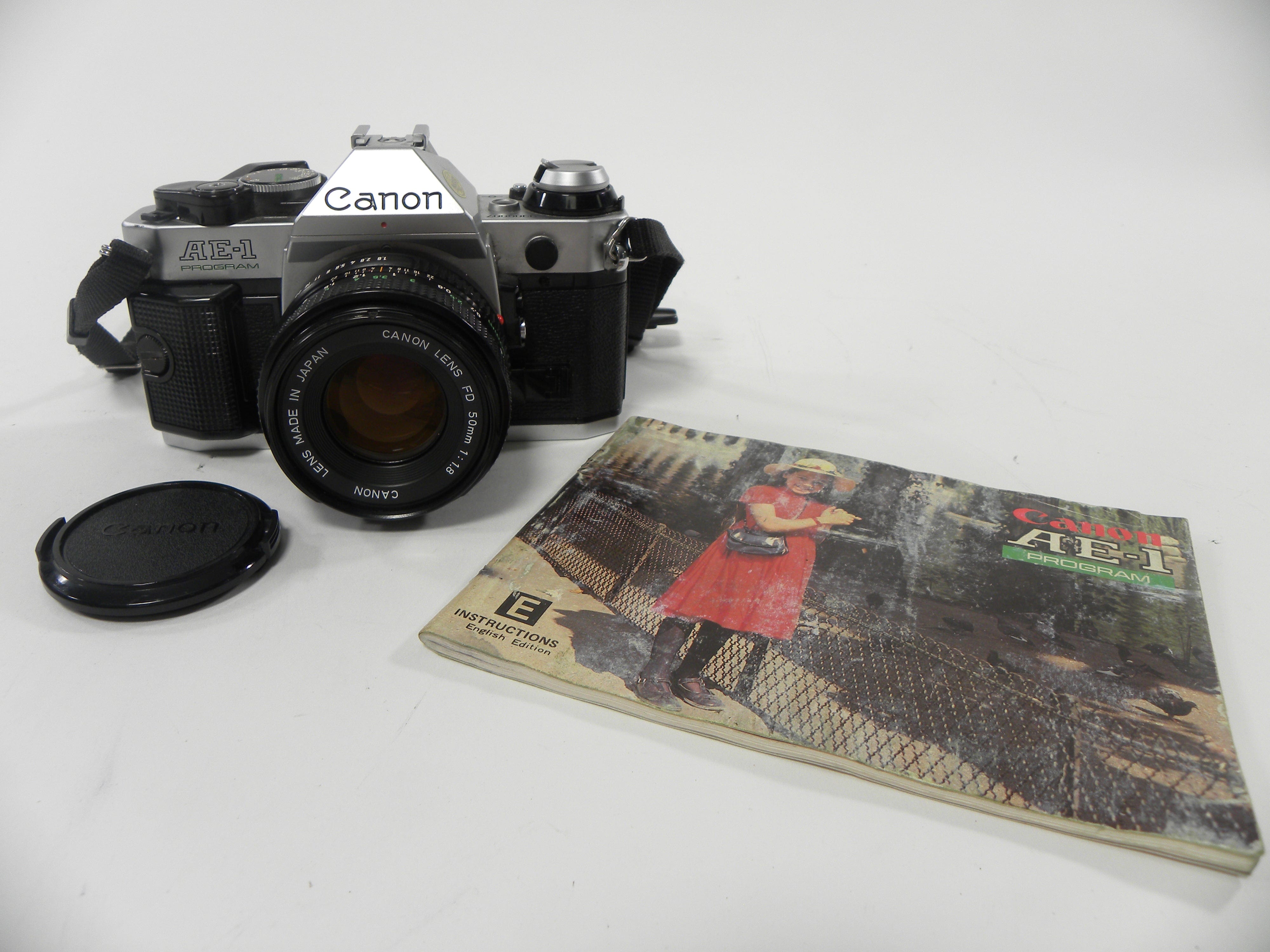 Canon AE-1 Program 35mm SLR w/FD 50mm f1.8 – Camera Exchange