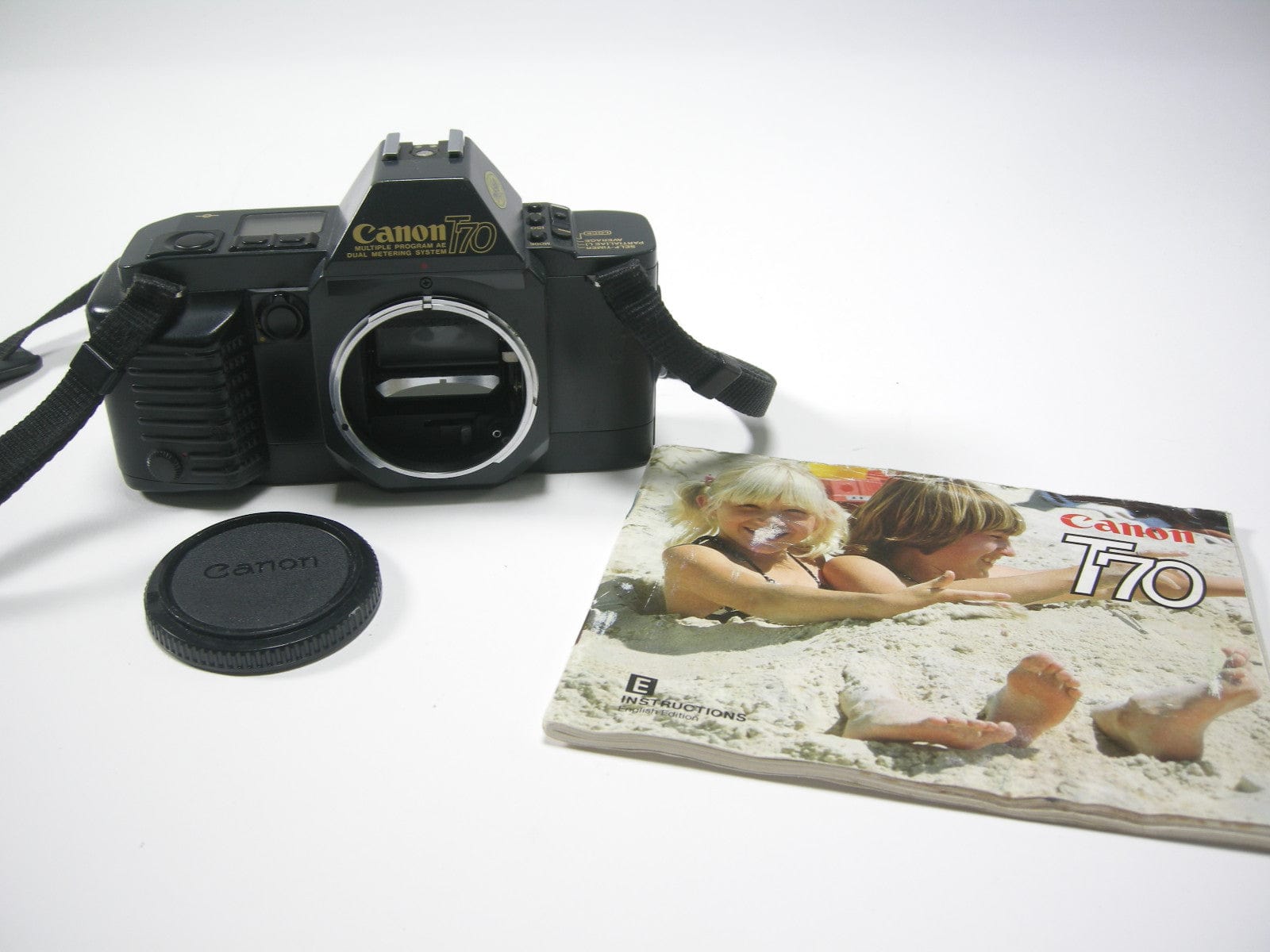 Canon T70 Multi Program AE 35mm SLR body only Camera Exchange