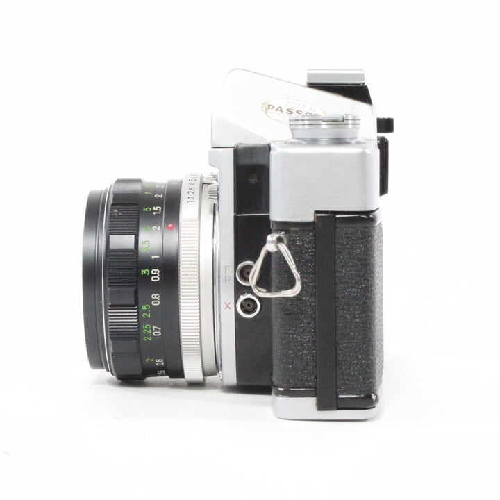 Minolta SRT 101 with 55mm f/1.7 lens – Camera Exchange