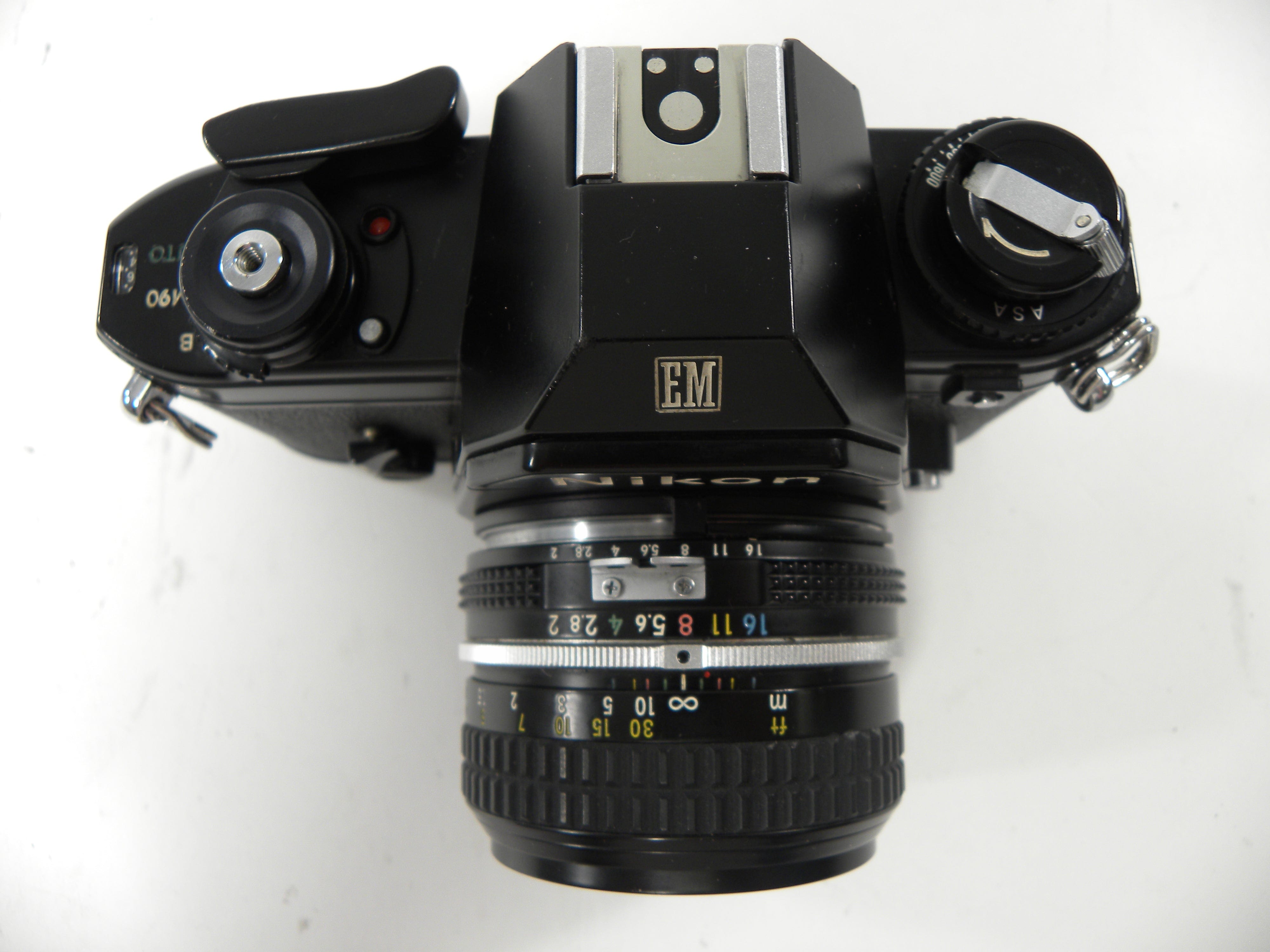 Nikon EM 35mm SLR film camera w/Nikkor 50mm f2 – Camera Exchange