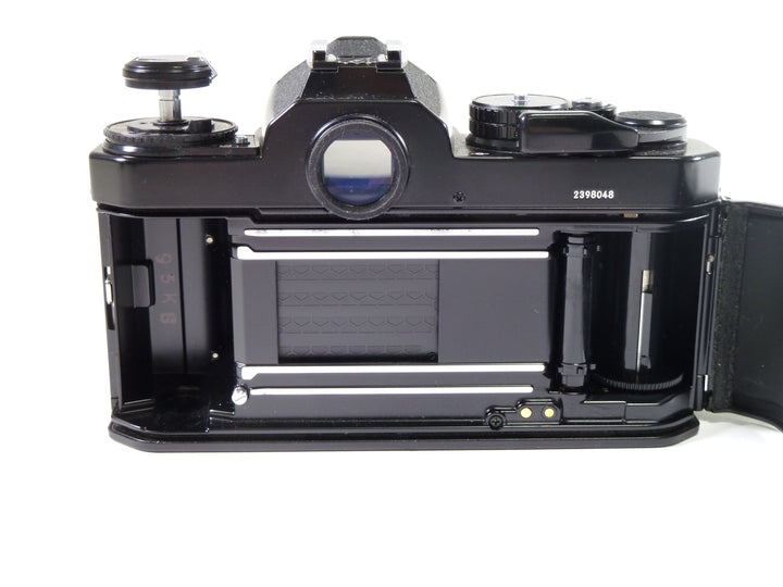 Nikon FE2 35mm film camera with FA-FE2 focusing screen and Promatic fl ...