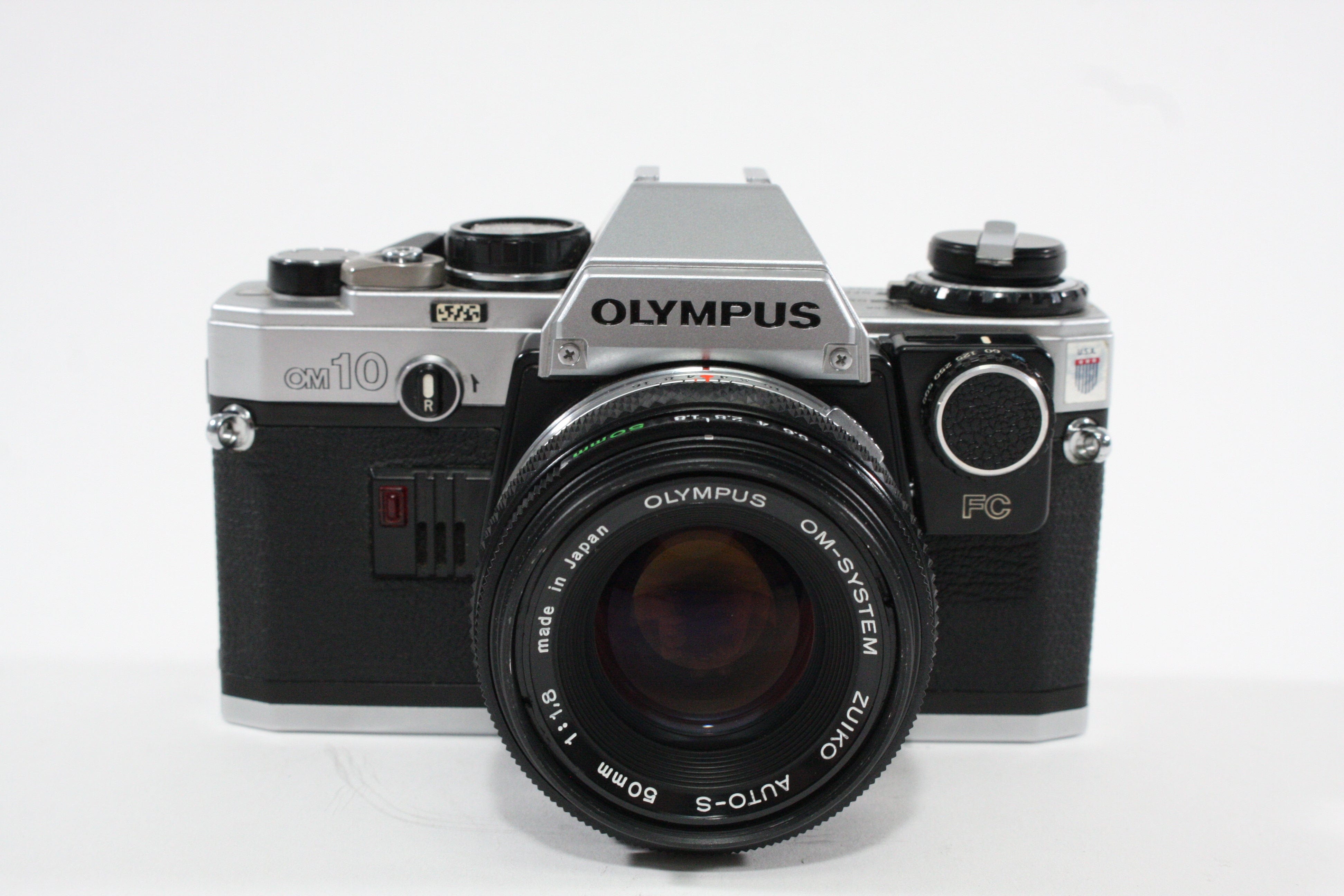 Olympus OM-10 with Zuiko 50mm f/1.4 – Camera Exchange
