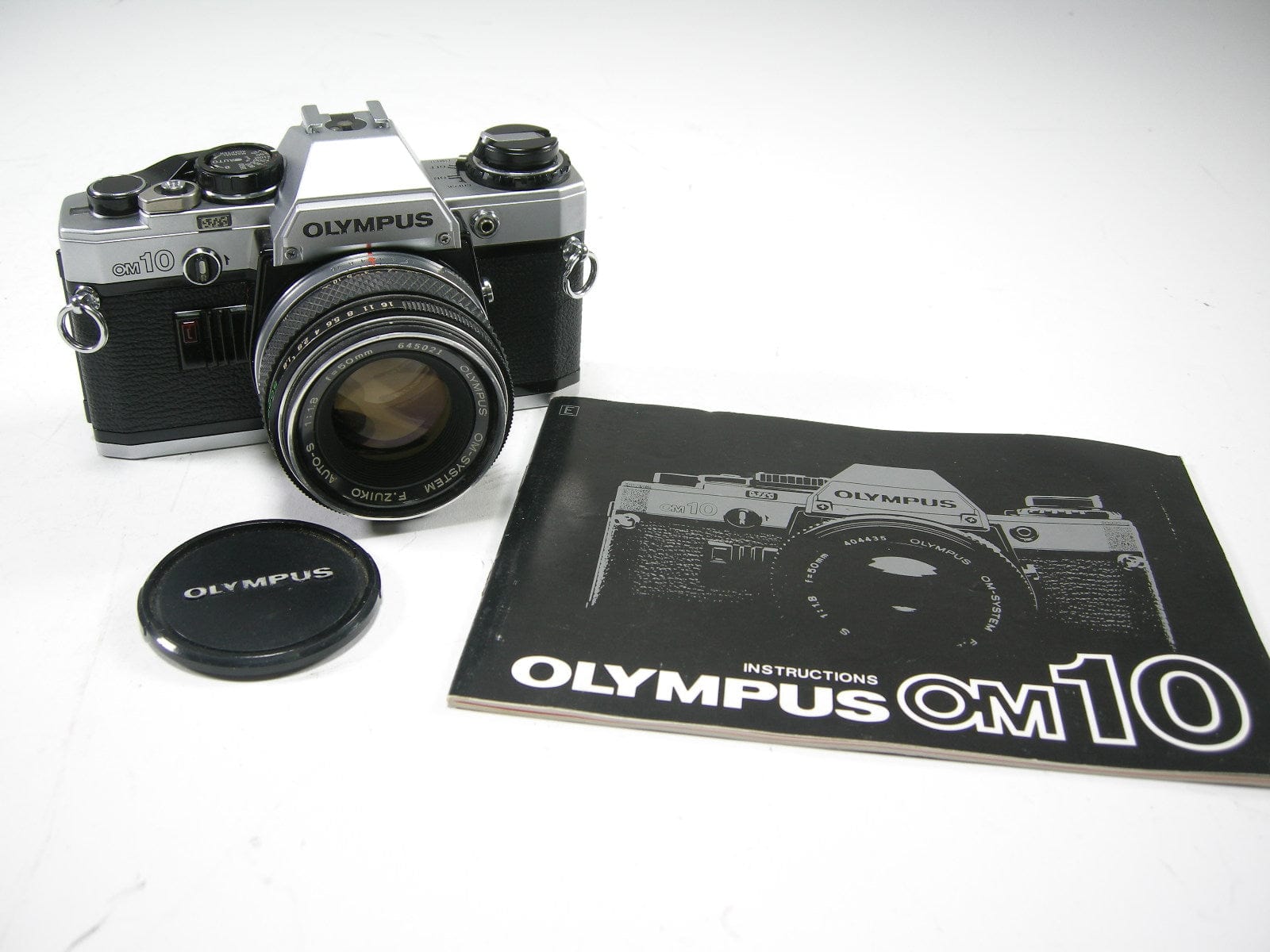 Olympus OM10 35mm SLR w/F.Zuiko Auto-S 50mm f1.8 – Camera Exchange