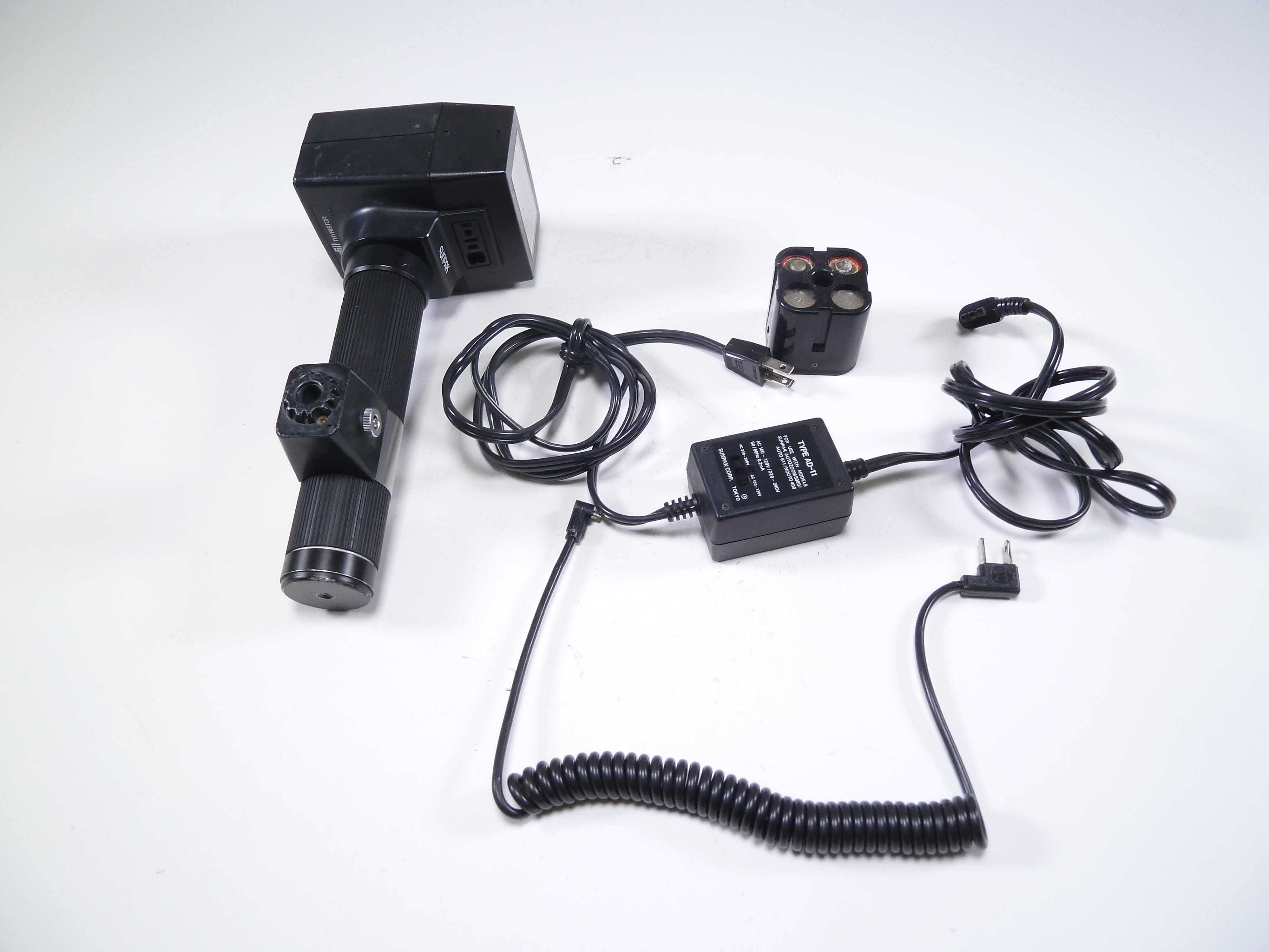 Sunpak 611 Auto Thyristor Handle Mount Flash AS IS – Camera Exchange