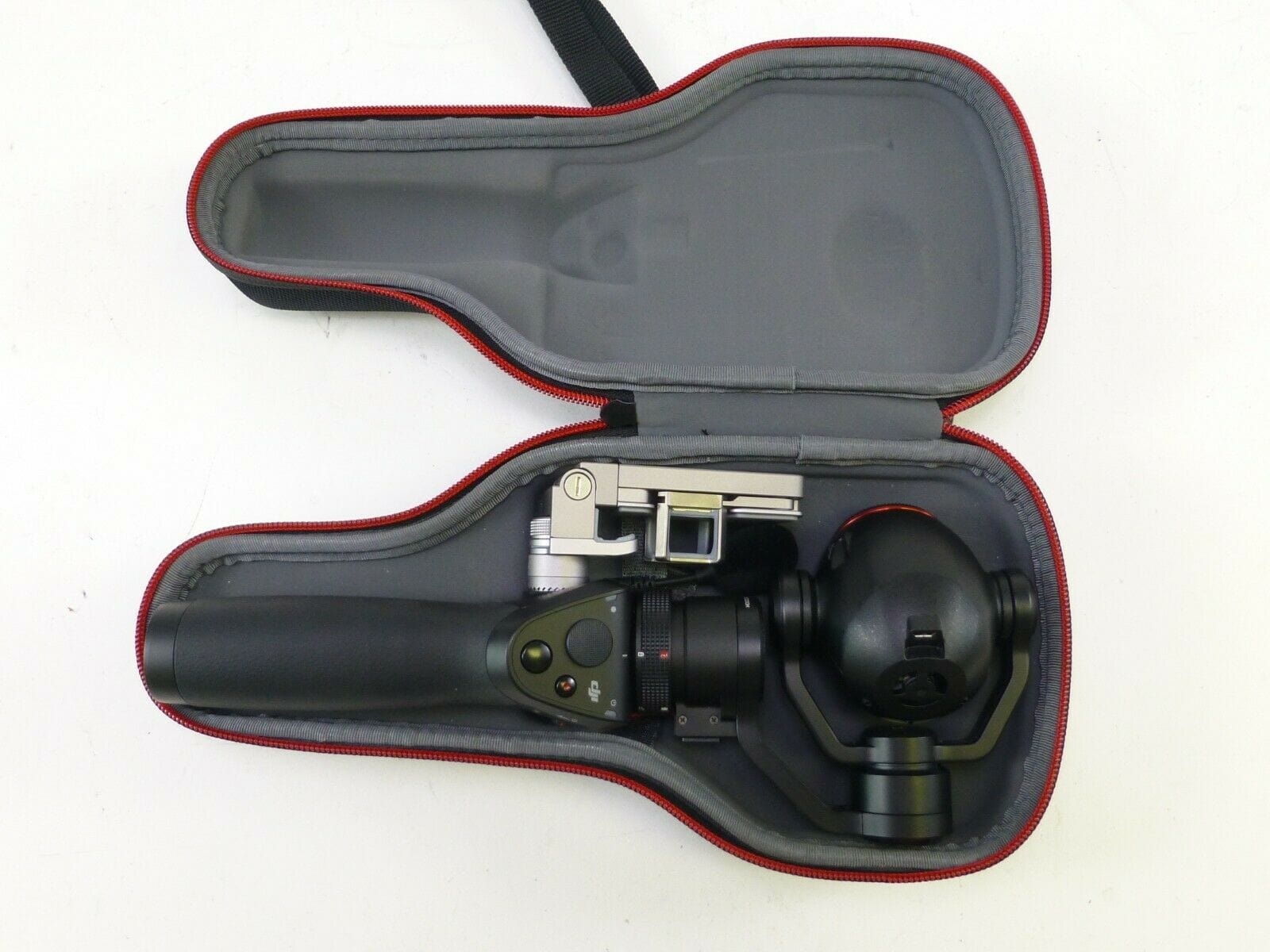 DJI Osmo+ 4K with Case, Battery, Charger, and Microphone. Being