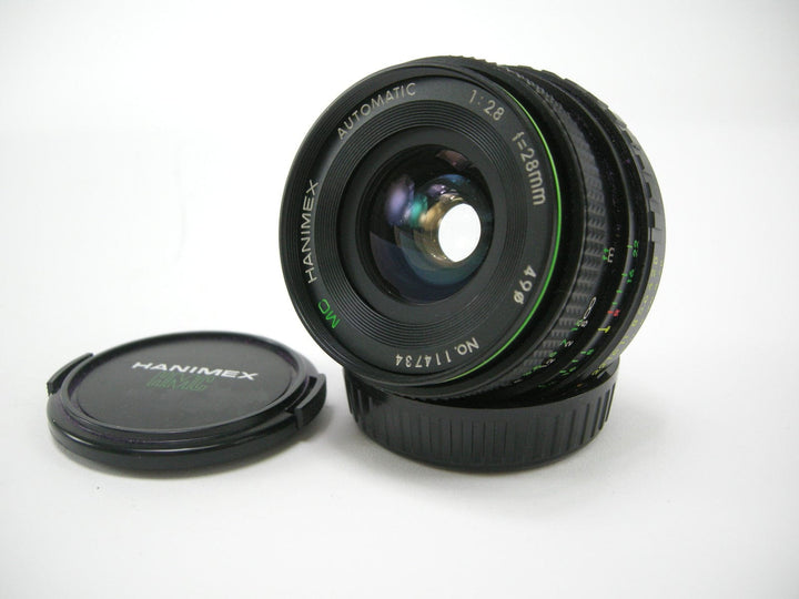 Lot - A Hanimex MC Automatic 1:28 f=28mm Camera Lens, Japan, Protective Lot - A Hanimex MC Automatic 1:28 f=28mm Camera Lens, Japan, Protective