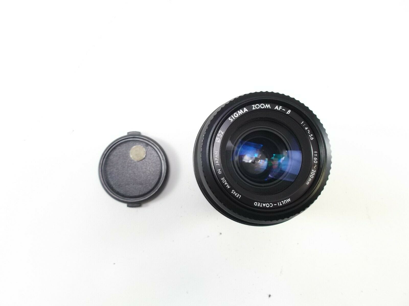 Sigma 60-200mm f/4-5.6 For A Mount with Lens Caps in Excellent Condition.